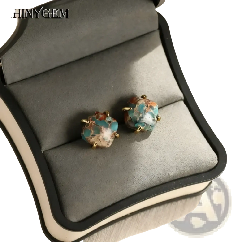 A pair of imperial jasper gold square stud earrings with turquoise and gold-toned marbled organic stones