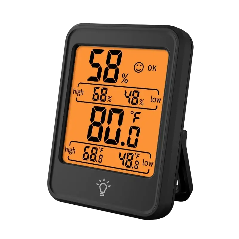 Indoor digital temperature humidity meter with black casing and orange display showing temperature and humidity readings