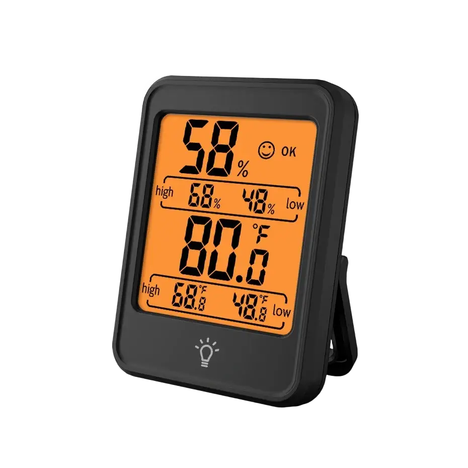 Black indoor digital temperature humidity meter with stand featuring orange display showing temperature and humidity readings