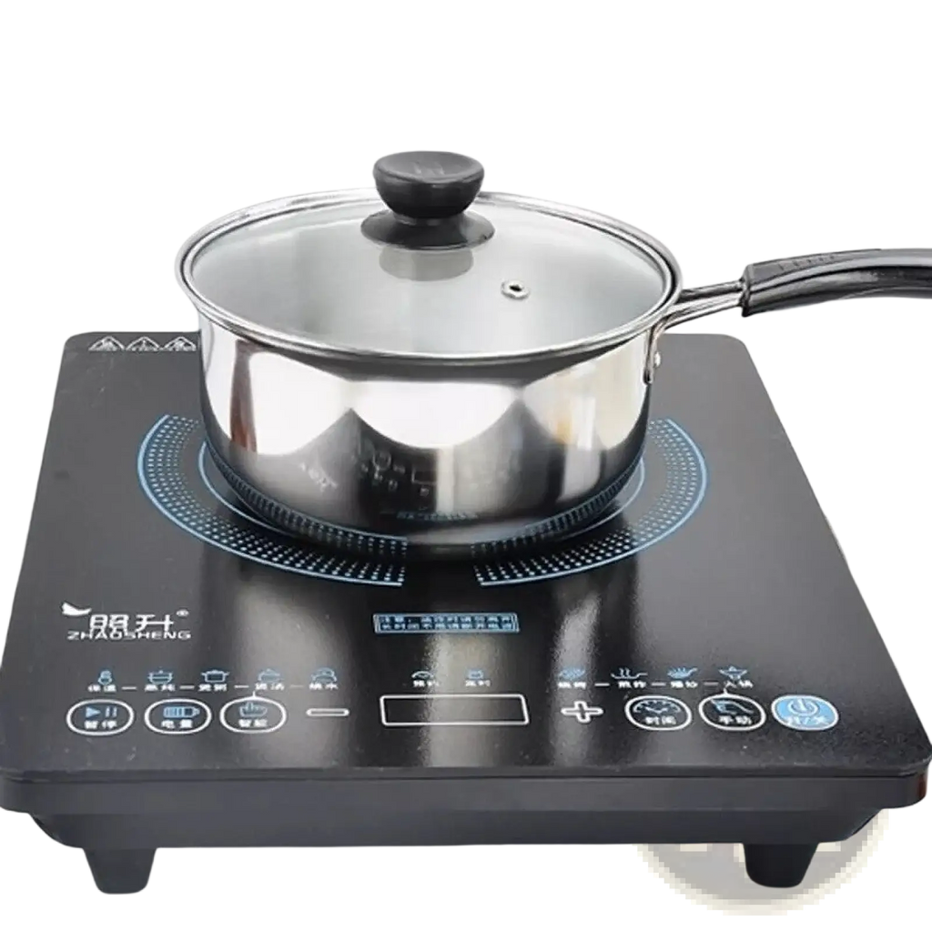 A sleek black induction cooktop with a stainless steel pot and glass lid from the induction stainless steel cookware set