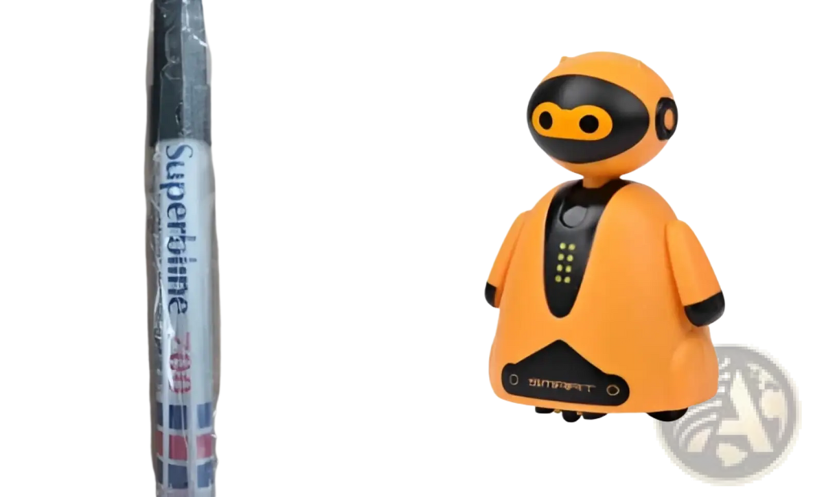 Orange and black inductive magic pen toy truck following car with rounded head glowing yellow eyes and led lights on chest