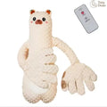 Cream-colored plush polar bear-shaped remote controlled soothing heating toy with textured fabric and embroidered face
