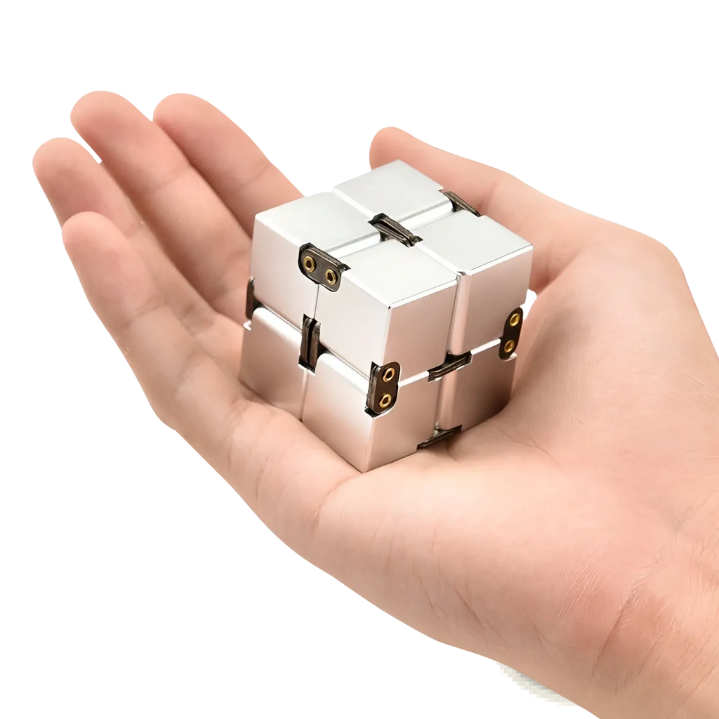 Silver metallic infinity cube fidget toy made of zinc alloy with black hinges and gold circular accents for stress relief