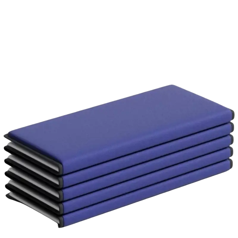 Stack of five royal blue hardcover notebooks with black edges and white pages highlighting product selling points