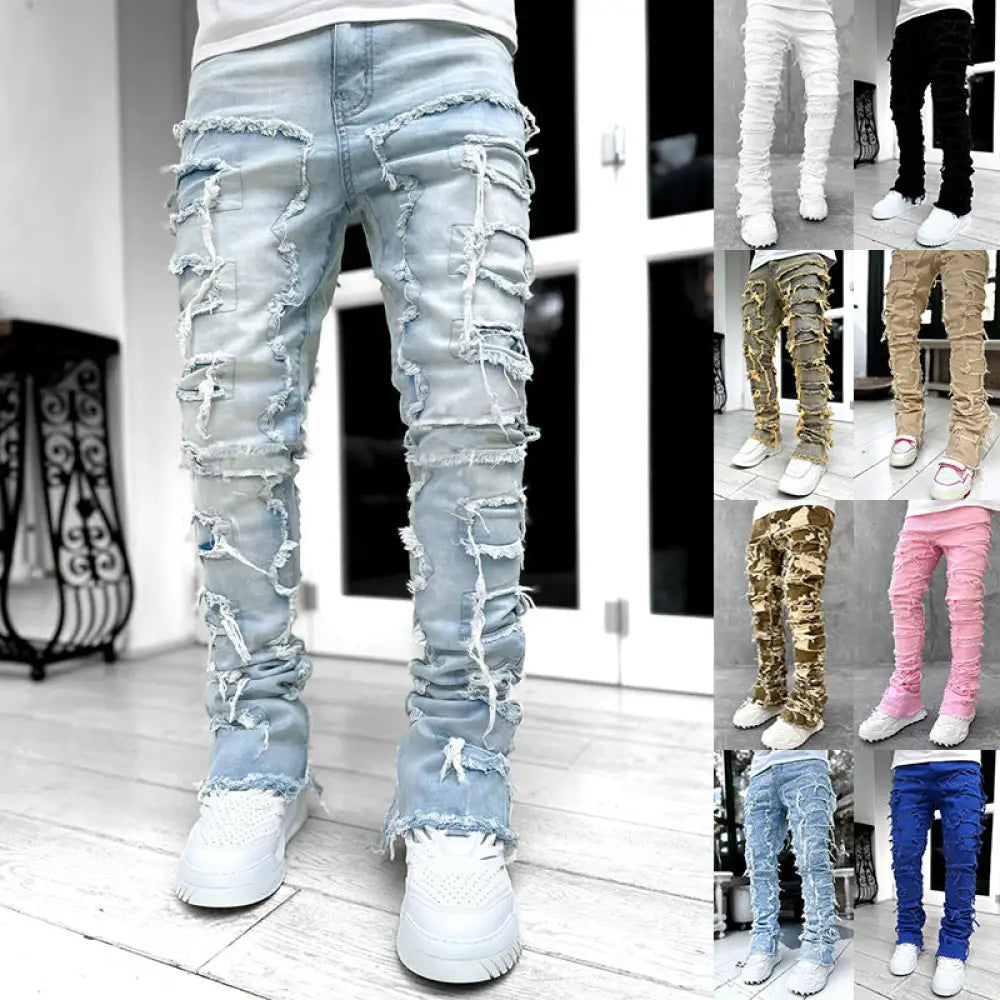 Men’s light-wash denim slim fit stacked ripped patchwork jeans with extensive frayed distressing along the legs