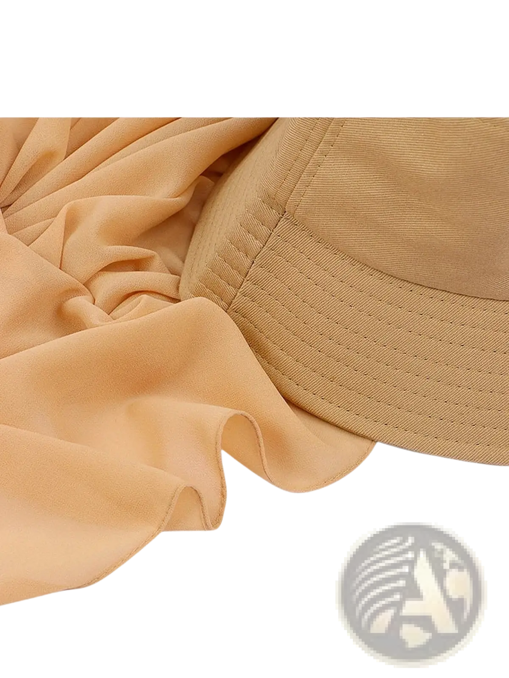 Beige instant hijab bucket hat with quilted brim and chiffon scarf draped beside it showcasing soft fabric