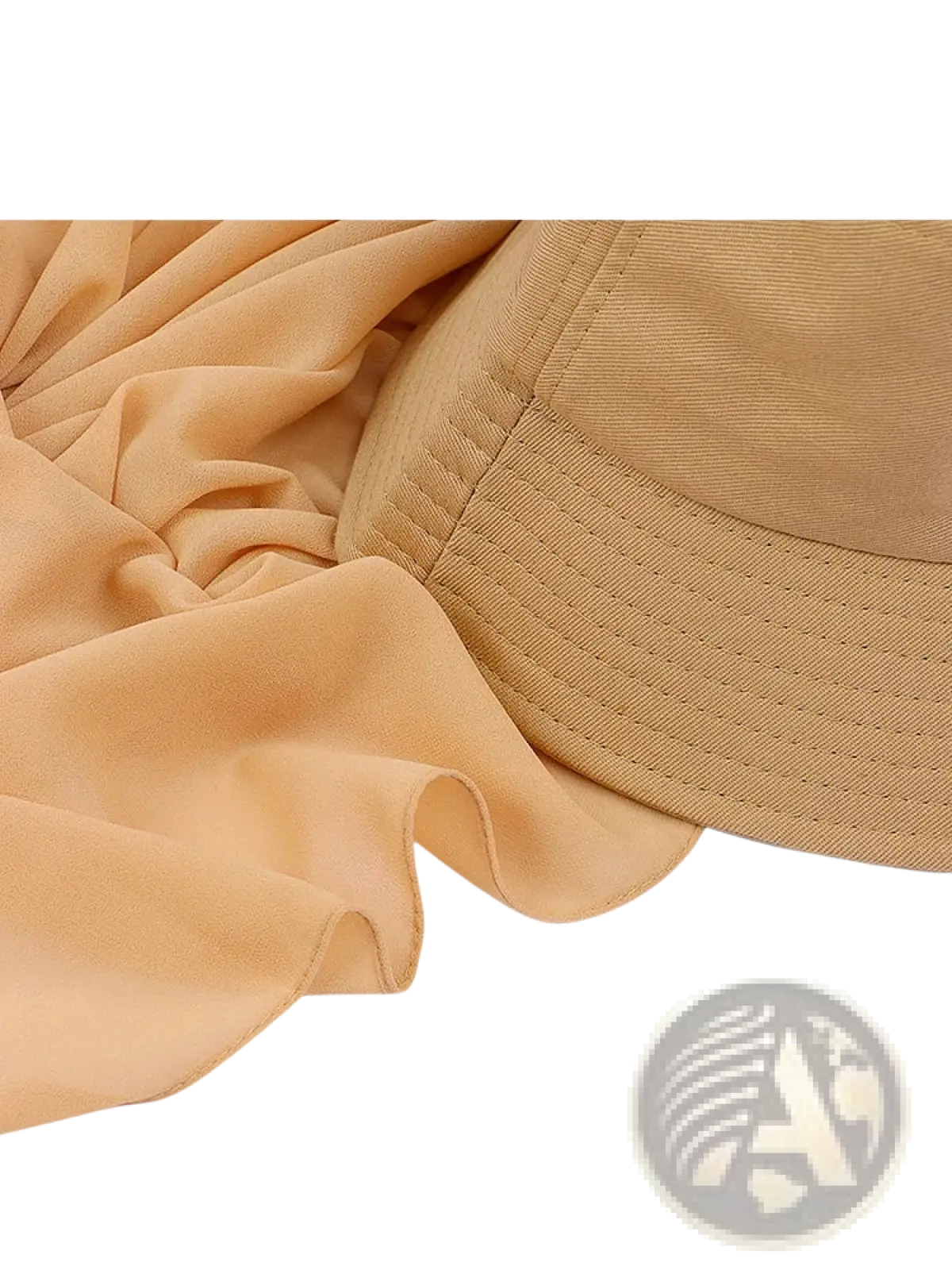 Beige instant hijab bucket hat with quilted brim and chiffon scarf draped beside it showcasing soft fabric