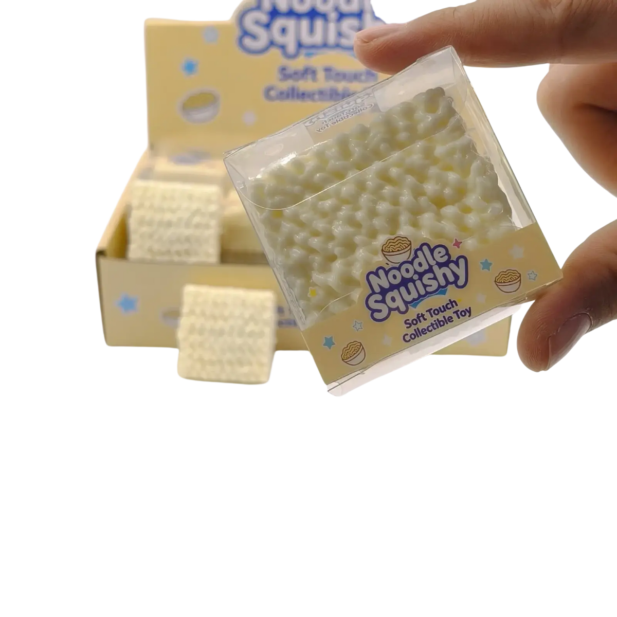 Instant noodle squishy toy stress relief building block in white noodle shape packaged in clear plastic with yellow label