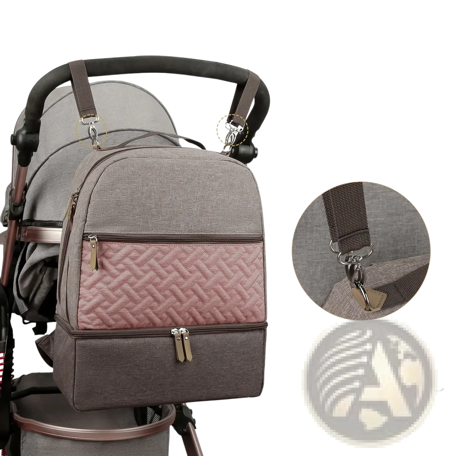 Insulated gray and pink quilted baby diaper backpack with brown zippers and metal hardware shown from the back side