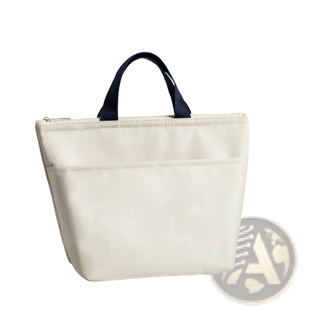 Cream-colored insulated oxford bento lunch bag with navy blue fabric handles and zipper closure