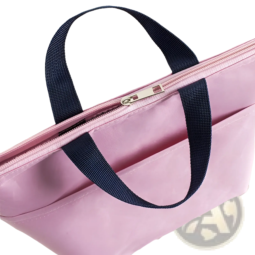 Insulated oxford bento lunch bag in pink with navy blue fabric handles and silver zipper closure