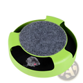 Interactive cat toy turntable bright green circular shape with gray felt center black cutouts and plush mouse inside