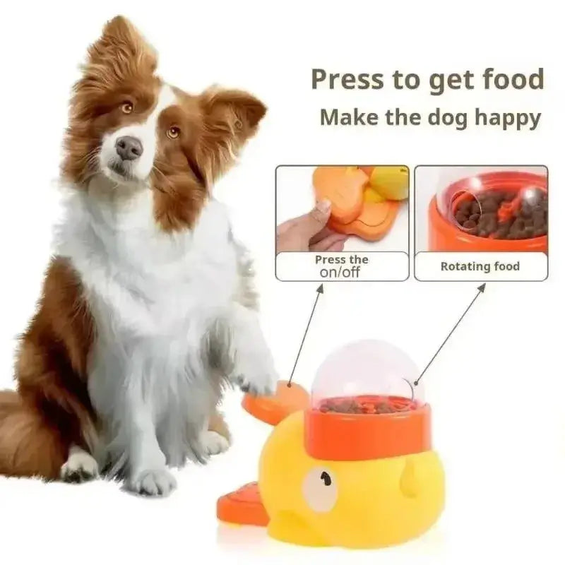 Yellow and orange plastic interactive dog ball toy shaped like a fish with a clear dome lid for treat dispensing