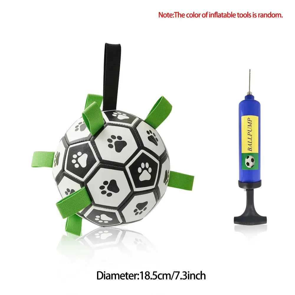 Interactive Halloween dog soccer ball toy with black and white design, green fabric tabs, and black handle for pets