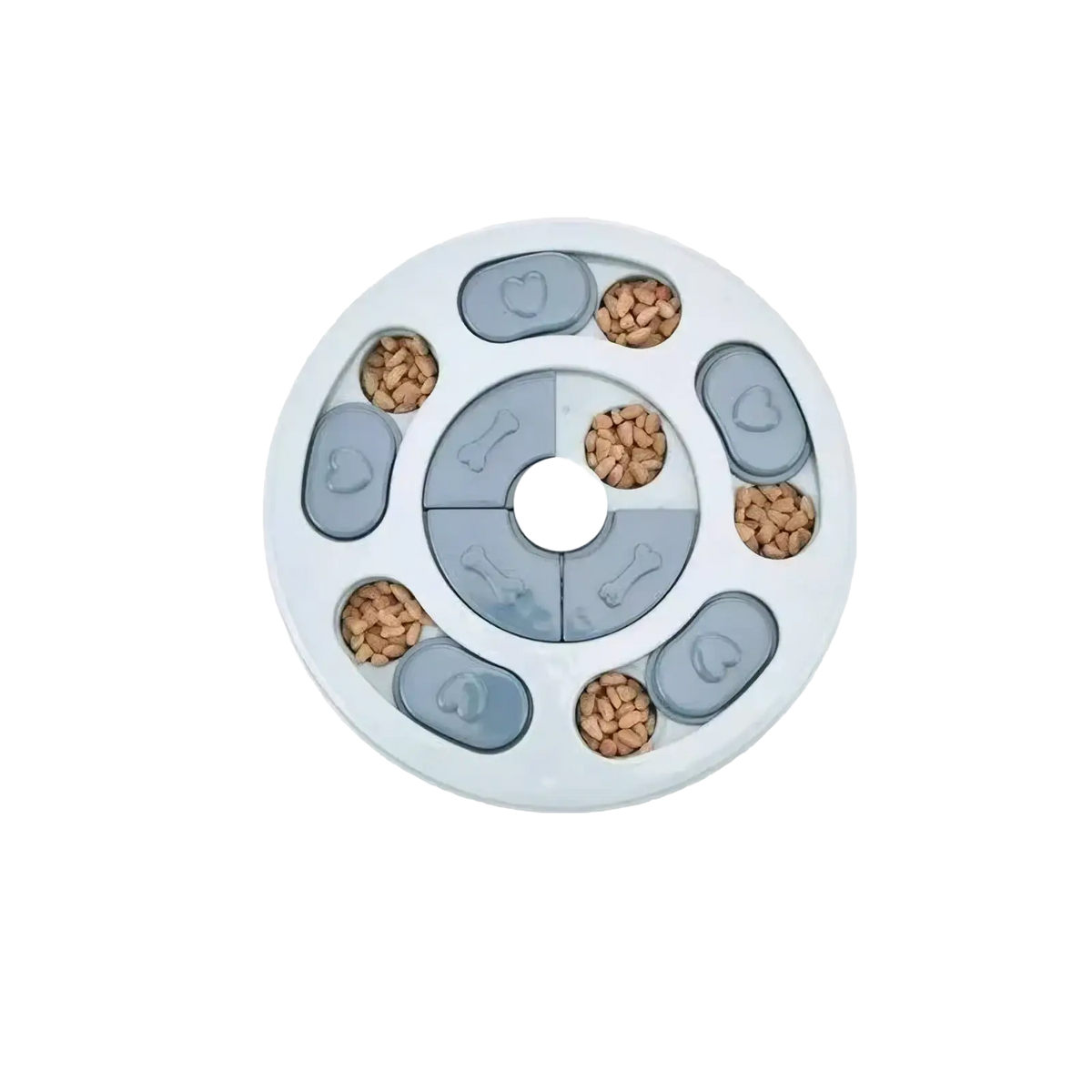 Interactive dog puzzle slow feeder toy in white and gray with heart and bone compartments filled with kibble