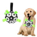 Interactive dog soccer ball with grab tabs made of pu leather in black and white with green ribbons to enhance customer satisfaction