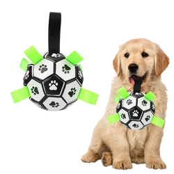 Interactive dog soccer ball with grab tabs made of pu leather in black and white with green ribbons to enhance customer satisfaction