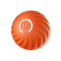 Orange spherical rechargeable interactive dog toy ball with textured ribbed surface and white power button center