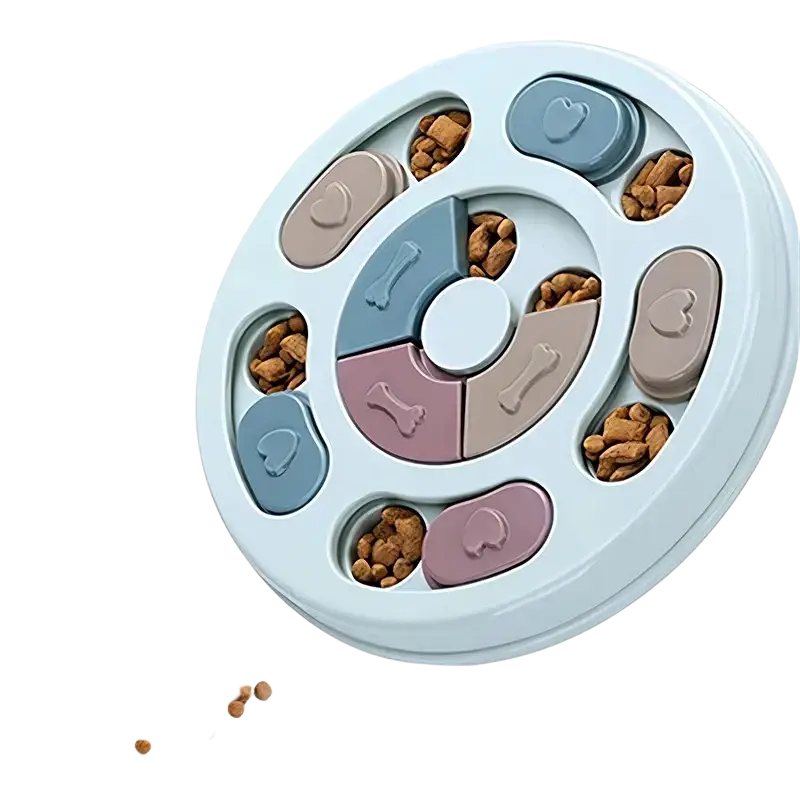 Light blue circular slow feeder dog toy with colorful heart and bone shaped sections for interactive educational feeding
