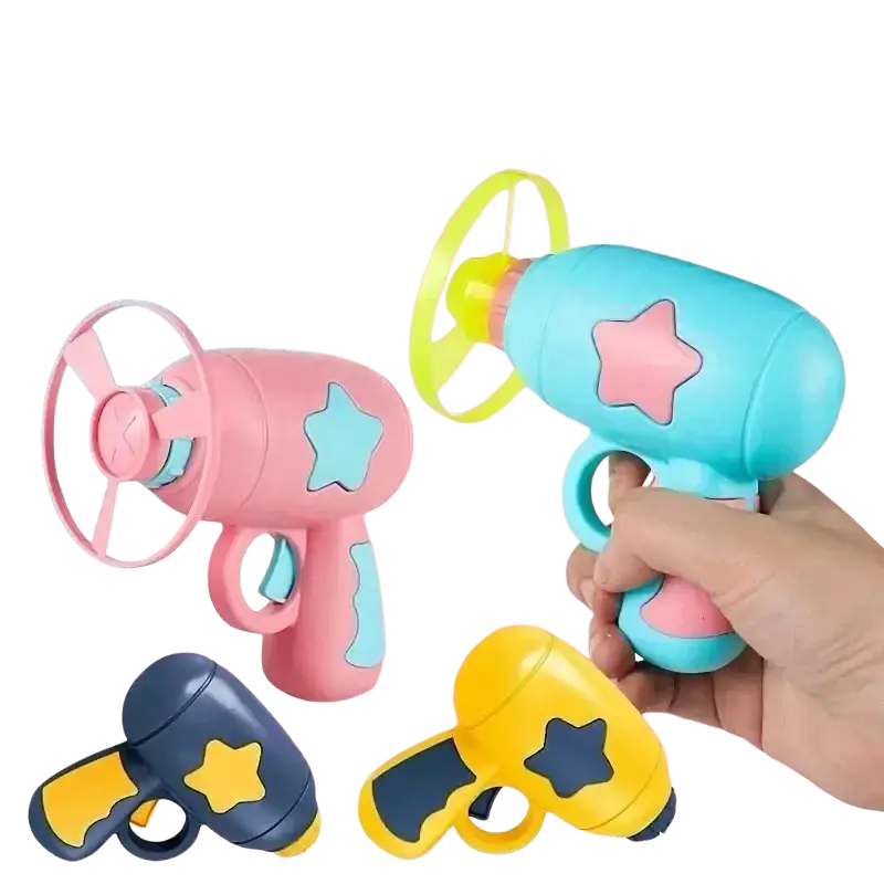 Interactive flying disc cat toy gun made of colorful plastic with star design and spinning propeller in multiple colors
