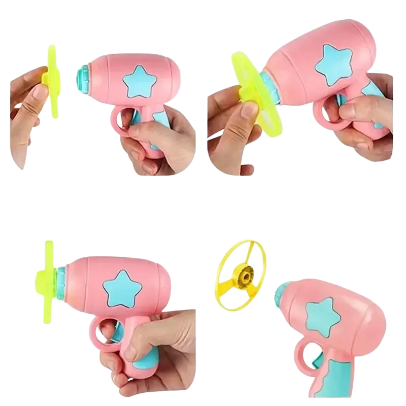 Interactive flying disc cat toy gun in pink plastic with light blue star decals and yellow propeller attachment