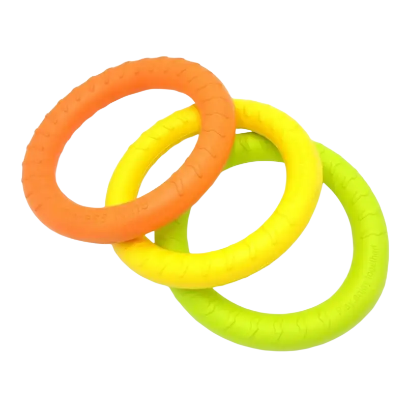 Three brightly colored textured rubber interactive training pet rings in orange yellow and lime green for chewing