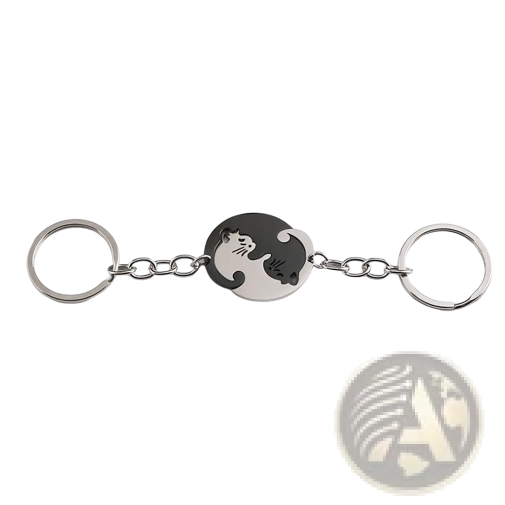 Silver-toned interlocking cat couple keychain set with circular yin-yang medallion featuring black and white cats