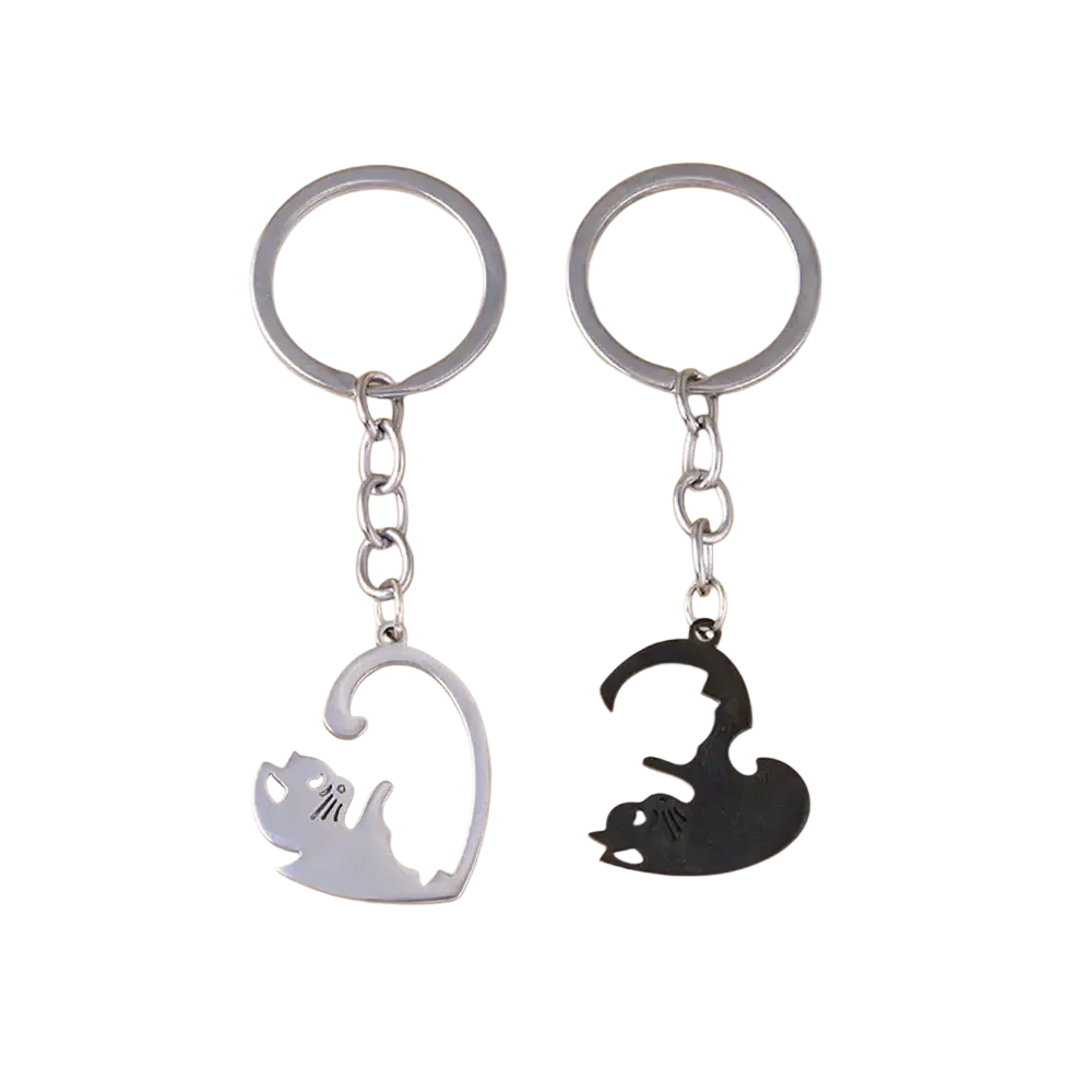 Silver and black cat-shaped interlocking keychain set with sleek minimalist metal design for couples or gift use