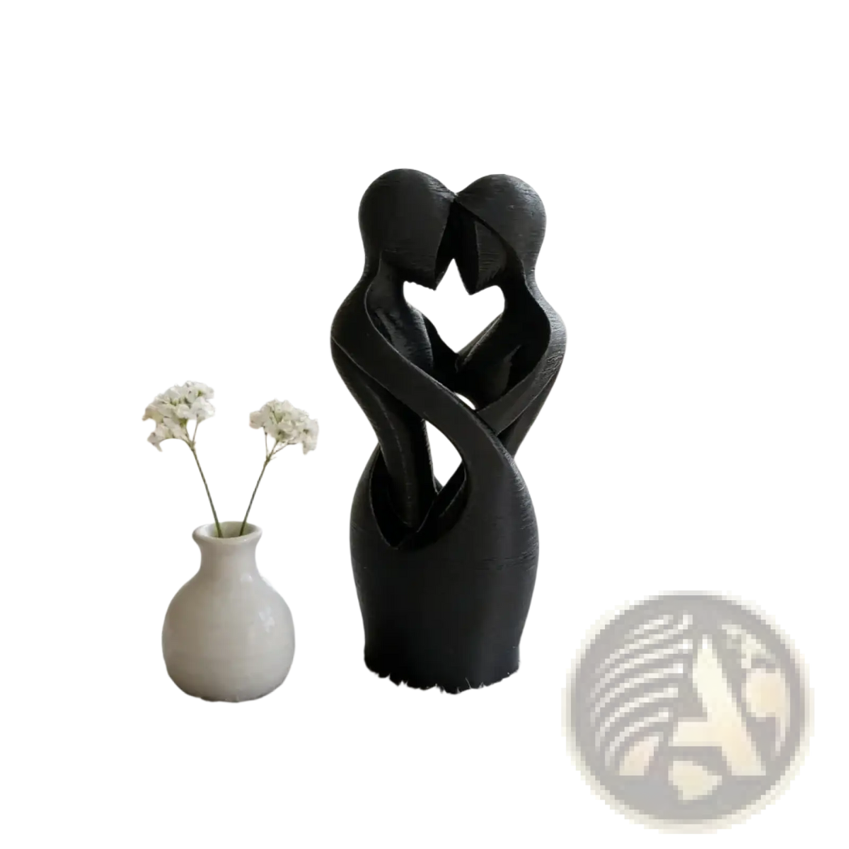 Black abstract sculpture of two intertwined figures forming a heart shape modern decor for home or office