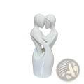 White ceramic sculpture of two abstract figures embracing to form a heart shape modern decor centerpiece