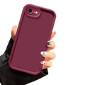 Back side of an iphone se 2022 matte shockproof case in sleek matte burgundy silicone with raised camera cutout and textured edges