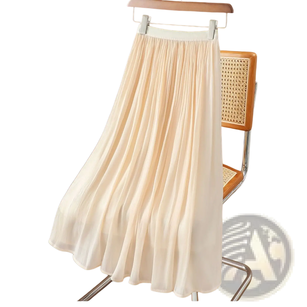 A flowing cream-colored iridescent chiffon pleated skirt made of lightweight fabric hanging on a wooden hanger