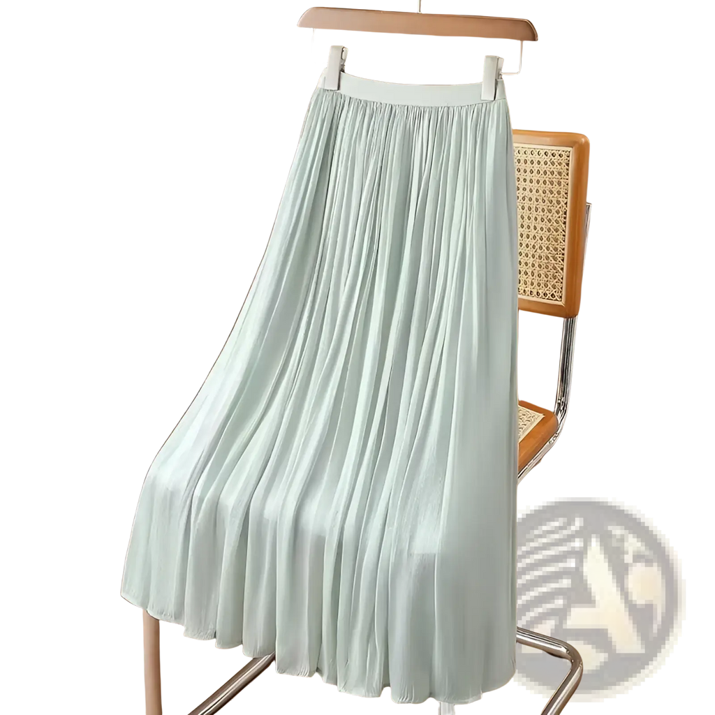 Iridescent chiffon pleated skirt in light mint green with white elastic waistband made of lightweight fabric