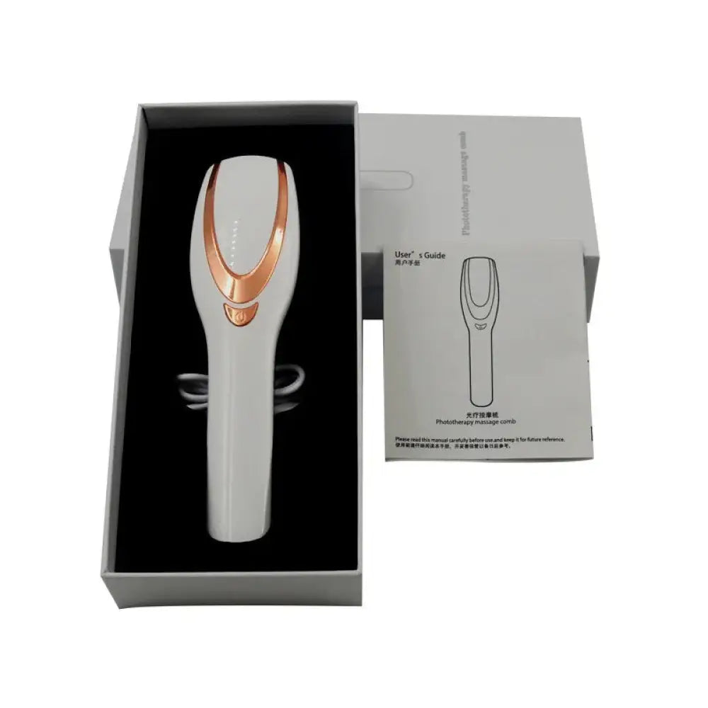 White and rose gold phototherapy scalp and hair massage comb with sleek ergonomic design for treatment use