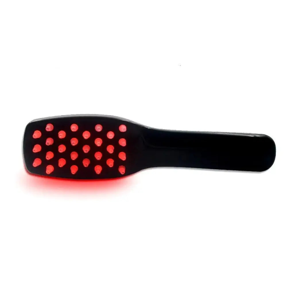 Black handheld iridescent phototherapy device with glowing red led grid for scalp and hair massage treatment