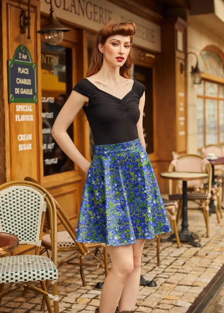Irises floral print vintage skater skirt in vibrant blue with green accents made of flowing fabric and elastic waist