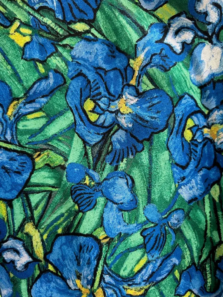 Irises floral print vintage skater skirt with elastic waist features vibrant blue irises with yellow centers on fabric
