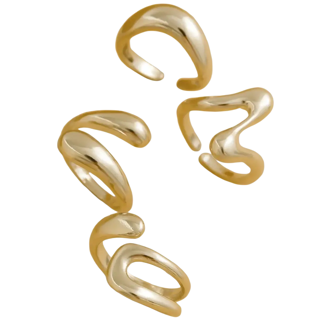 Set of four gold-toned open-ended rings with smooth sculptural curves and polished metallic finish for punk fashion