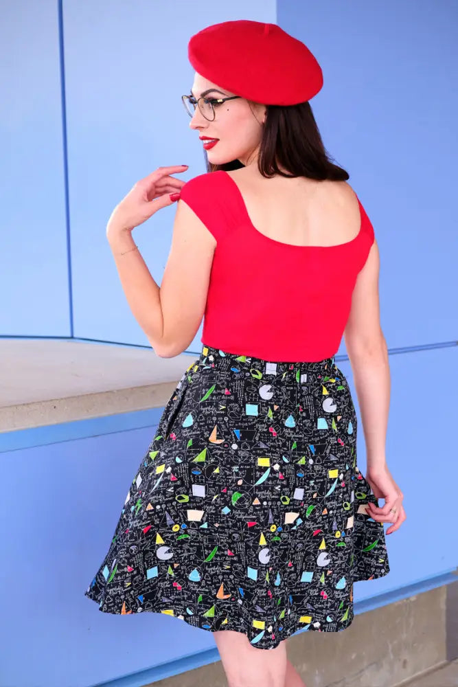 Red beret with a smooth matte finish paired with isabel red sweetheart retro knit top in a stylish look