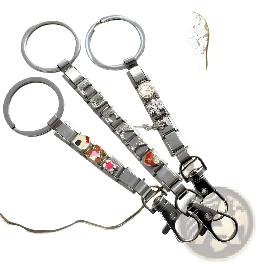 Three silver italian link charm keychains with colorful enamel charms and one featuring a small clock face