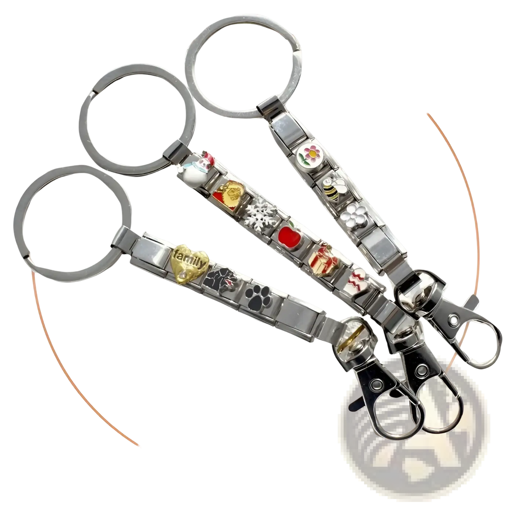 Three silver italian link charm keychains with colorful enamel charms linked by metallic segments for personalization