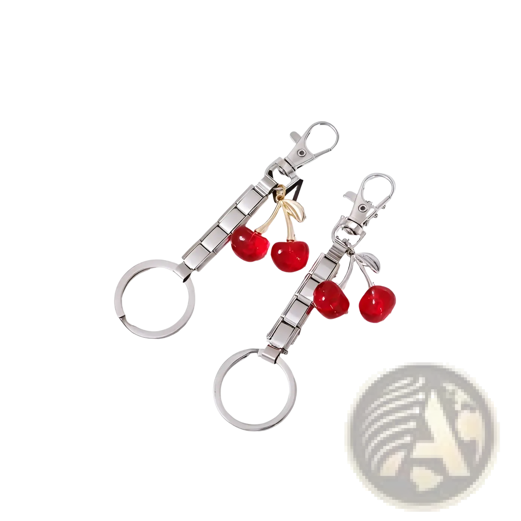 Italian link charm keychain in silver featuring two glossy red cherry charms with gold-tone stems and segmented metal body