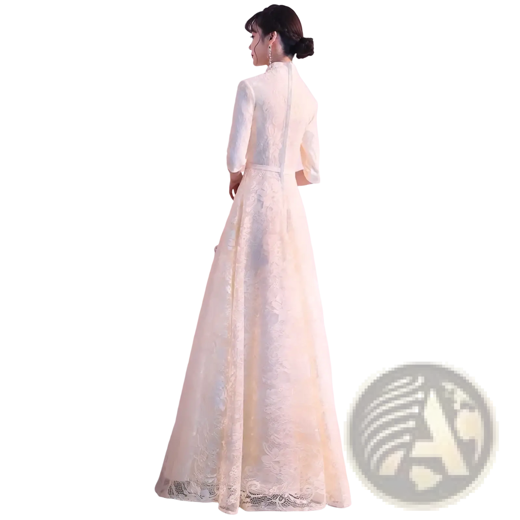 Ivory lace cheongsam wedding dress with a flowing gown, high neckline, and three quarter sleeves