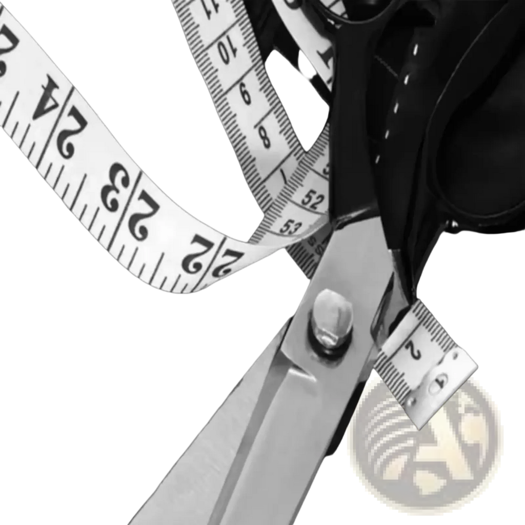 A pair of metallic scissors with black handles on dark pinstriped fabric beside a measuring tape for an ivory white men business suit jacket wedding formal