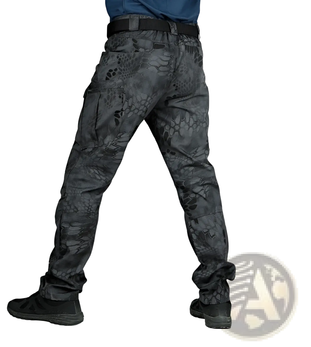 Ix7 men’s dark gray tactical cargo pants with subtle snake-scale camouflage pattern and multiple cargo pockets