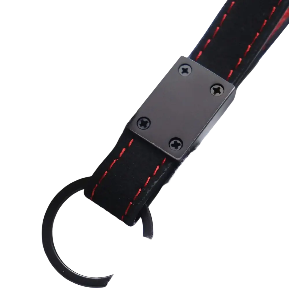 Black leather jac car keychain with red stitching and matte black metal plate secured by four screws