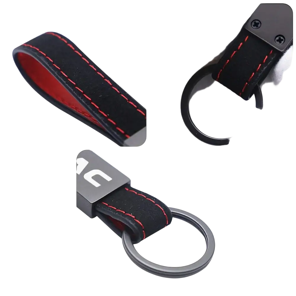 Black leather Jac leather car keychain with red stitching and a metallic ring for secure key attachment