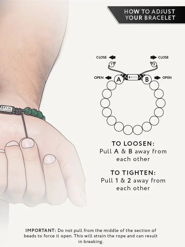 Bali African jade beaded bracelet with green beads gold accents and a silver-toned adjustable metal clasp