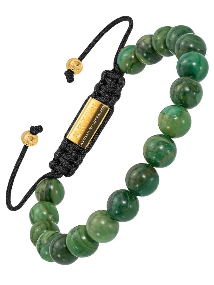 Bali African jade beaded bracelet with green marbled stones black braided cord and gold-toned metal accents