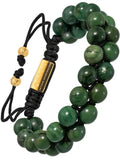 Adjustable African jade beaded bracelet with green beads, black braided cord, and gold-tone metal clasp accents